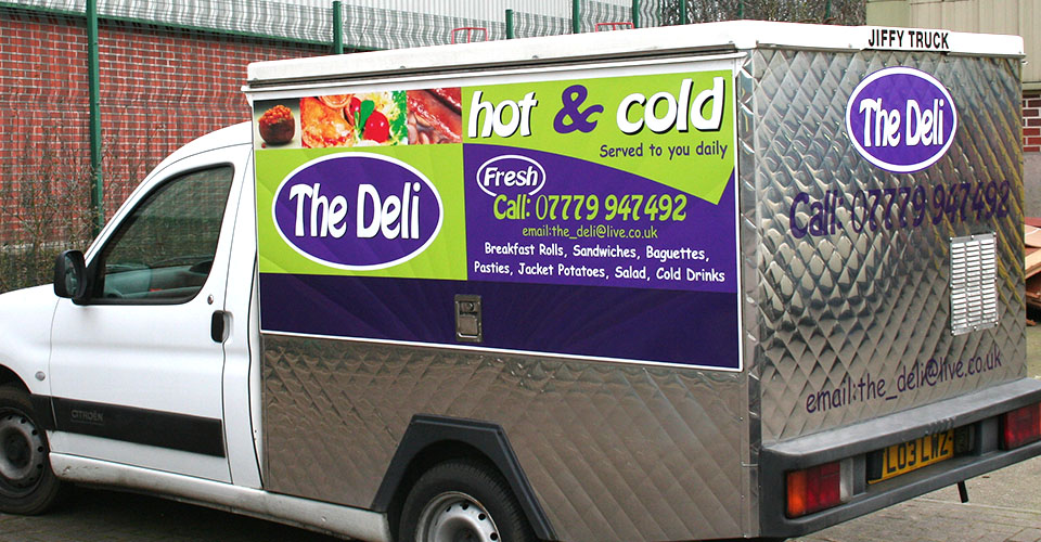 Van with digitally printed branded graphics